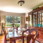 Dining Room View. Illuminated Decorative China Cabinet